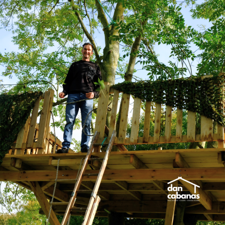 dan standing on tree house platform
